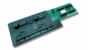 Draufsicht eines Bauteils, bei welchem Elektroniken mit Kunststoff umspritzt wurden